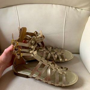 NWOT size 8.5 gold gladiator sandals